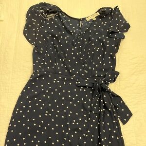 Navy blue polka dot faux-wrap dress